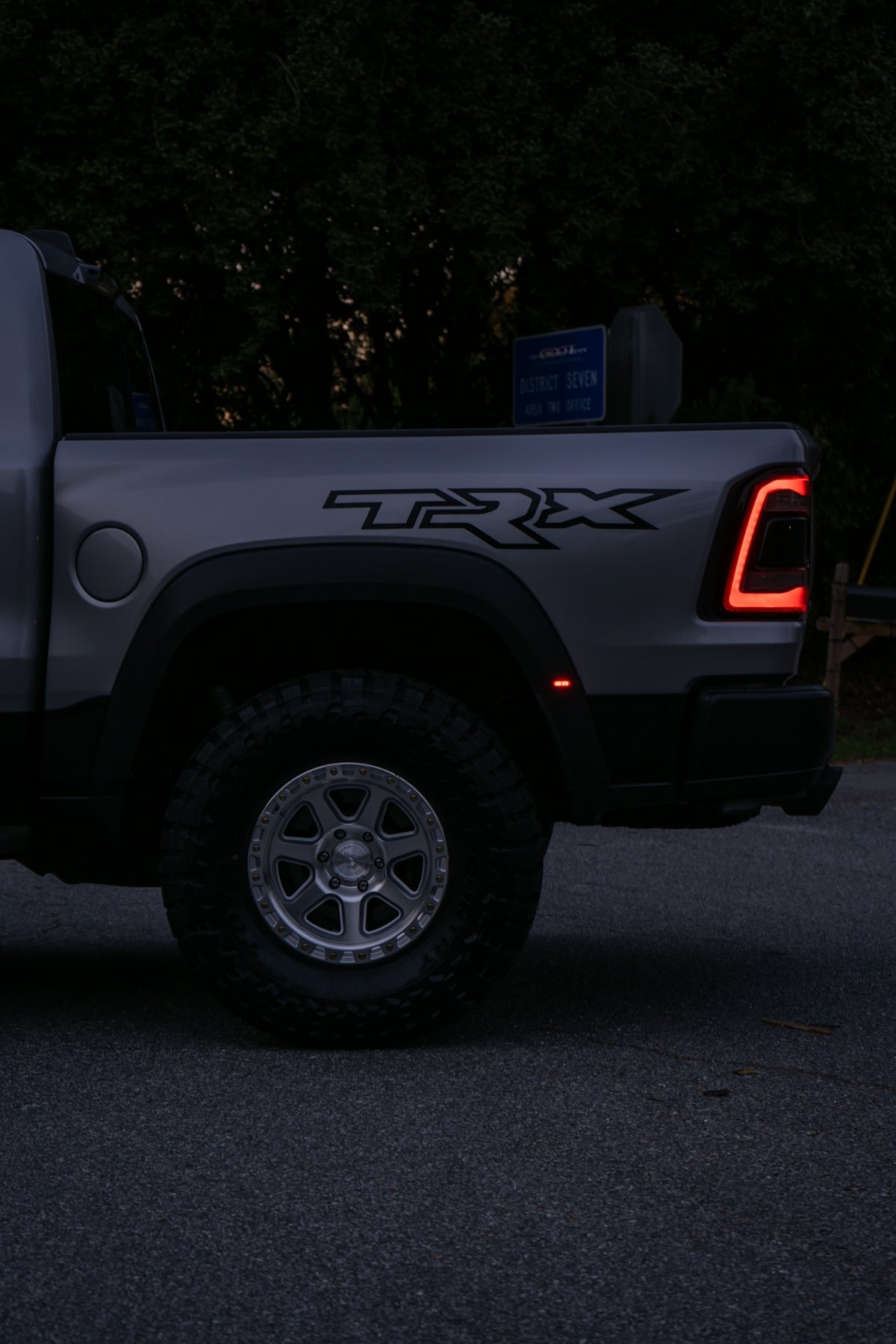 Silver pickup truck with trx badging at dusk